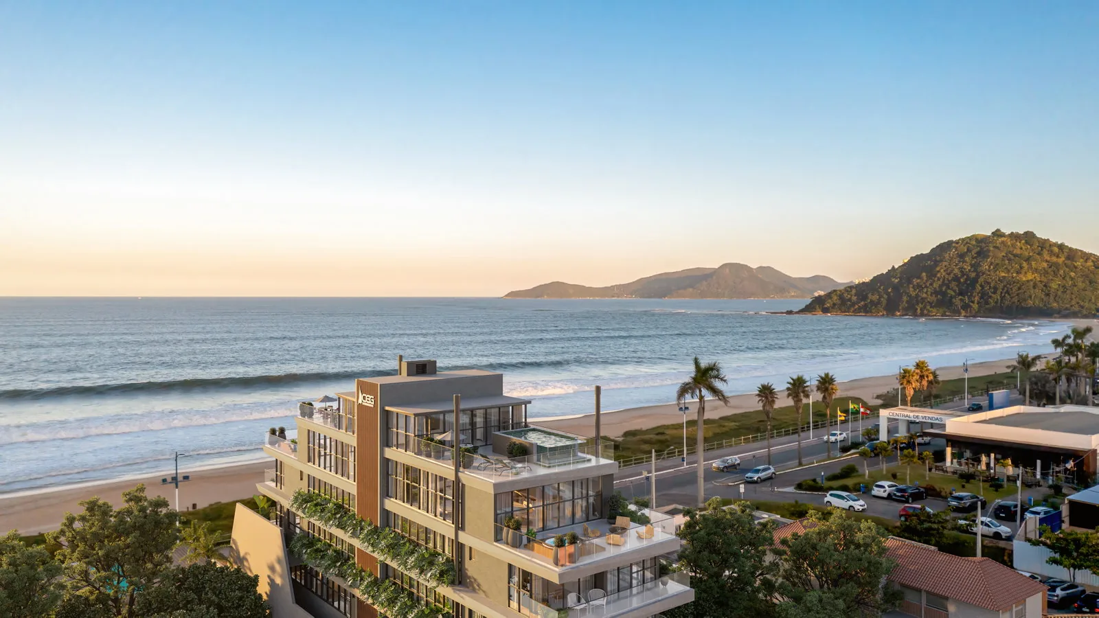 SENSE · vista lateral do edifício com a orla da Praia Brava ao fundo