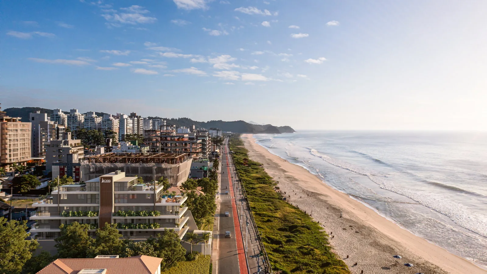 SENSE · vista aérea da orla da Praia Brava com a implantação do edifício